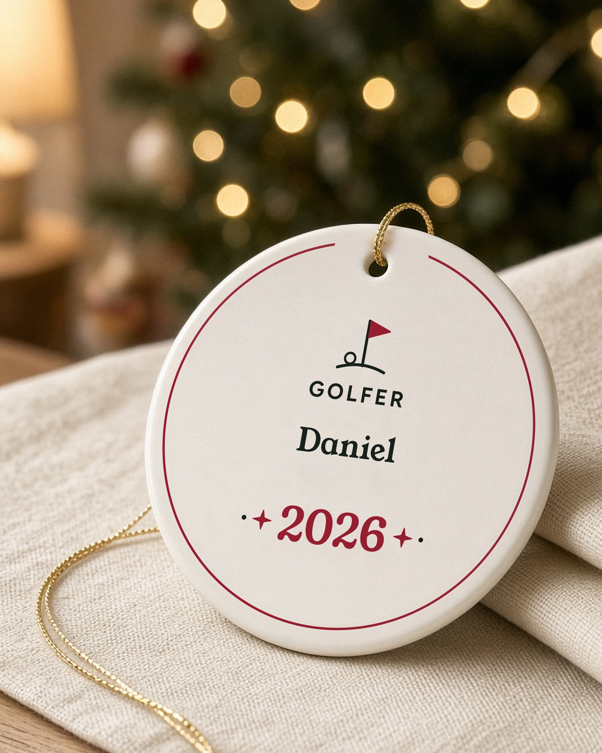 Personalized round ceramic ornament with golf flag and name